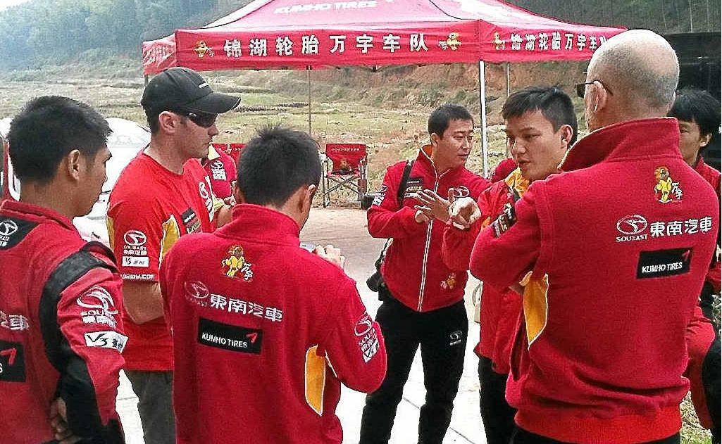 Nathan Quinn (second from right) conducts his first briefing with the support and mechanical team after arriving in China. Nathan Quinn (second from right) conducts his first briefing with the support and mechanical team after arriving in China.